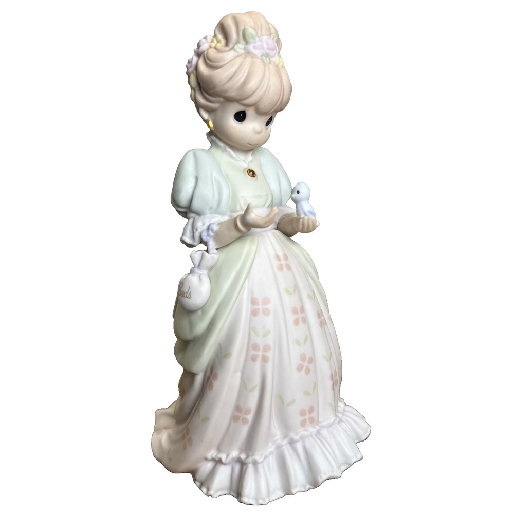 (11A)-8"Precious Moments Figurine 1997  Charity Begins In The Heart
